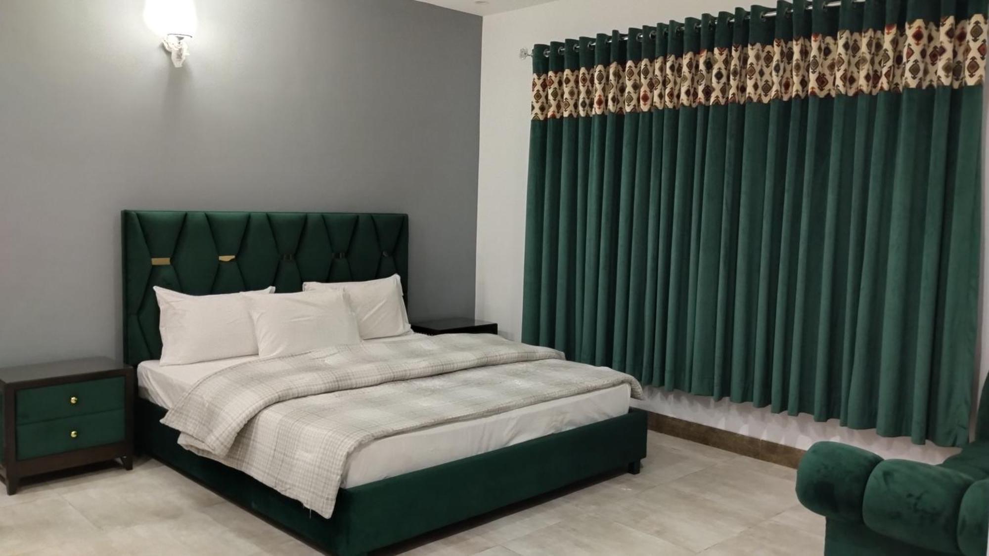 Islamabad Travelodge Guest House Oda fotoğraf