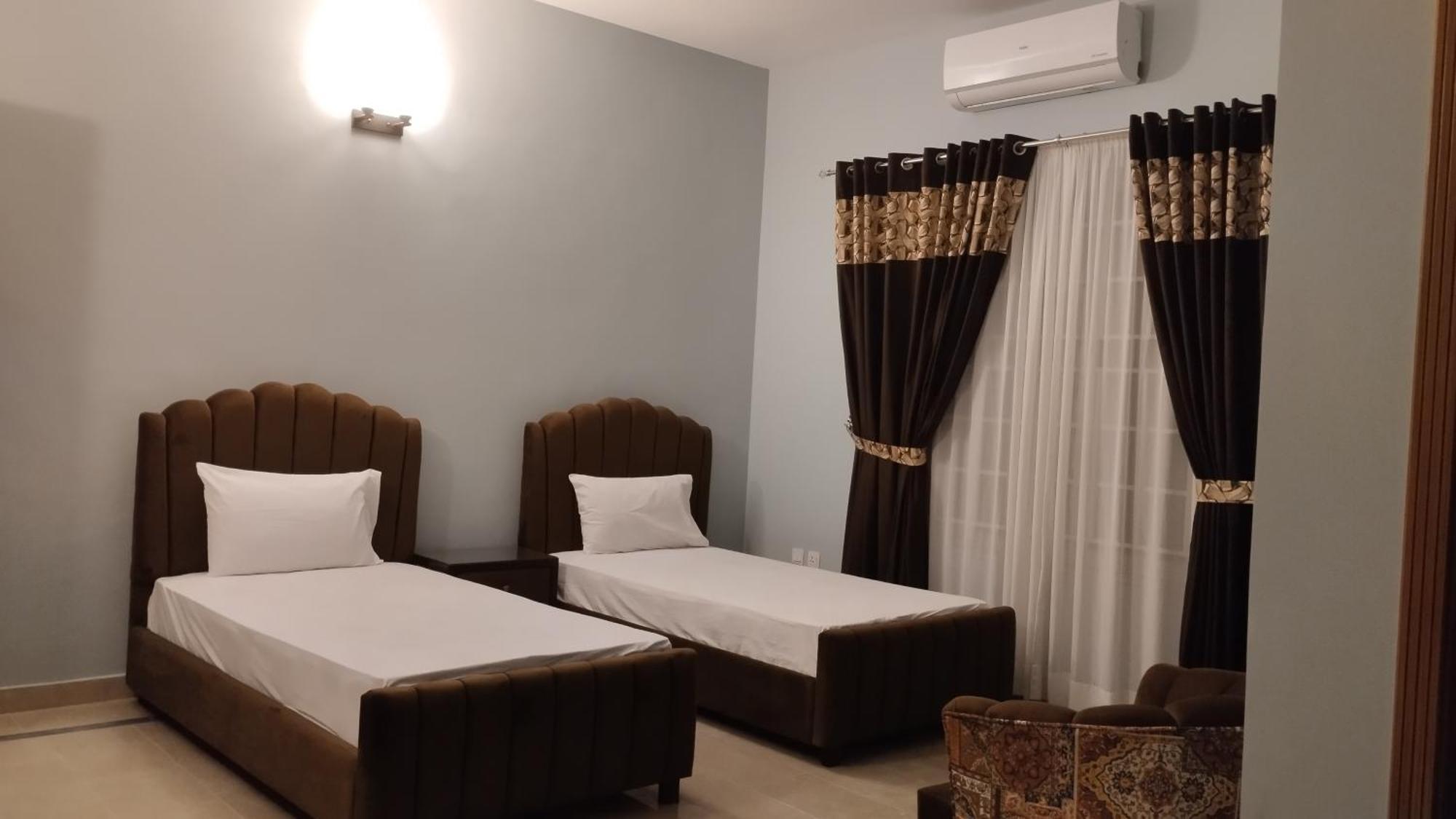 Islamabad Travelodge Guest House Oda fotoğraf